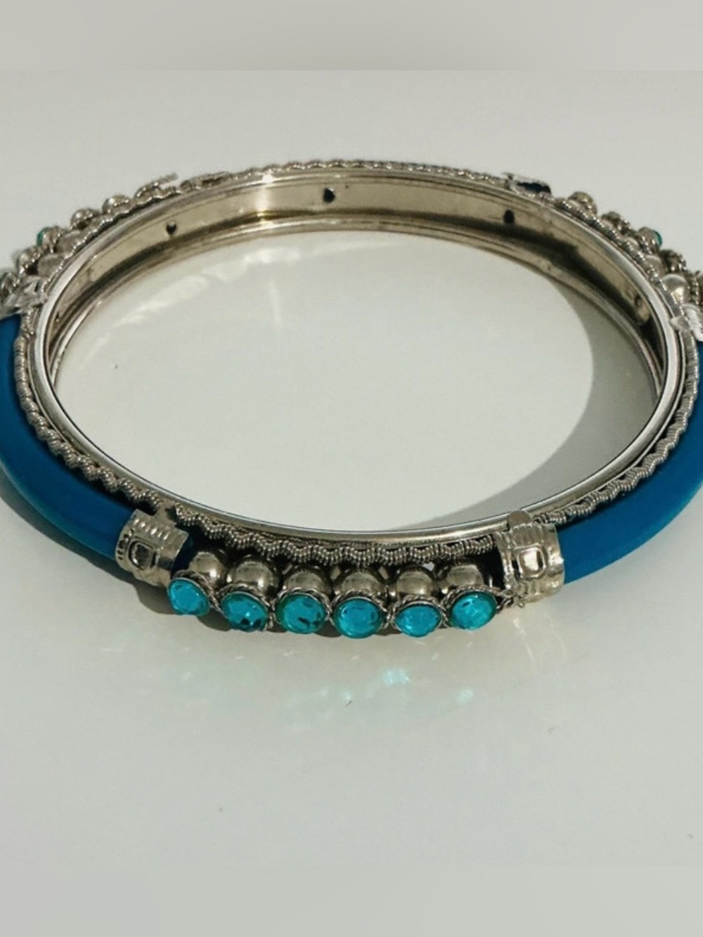 Silvertone & blue bangle bracelet with rhinestones